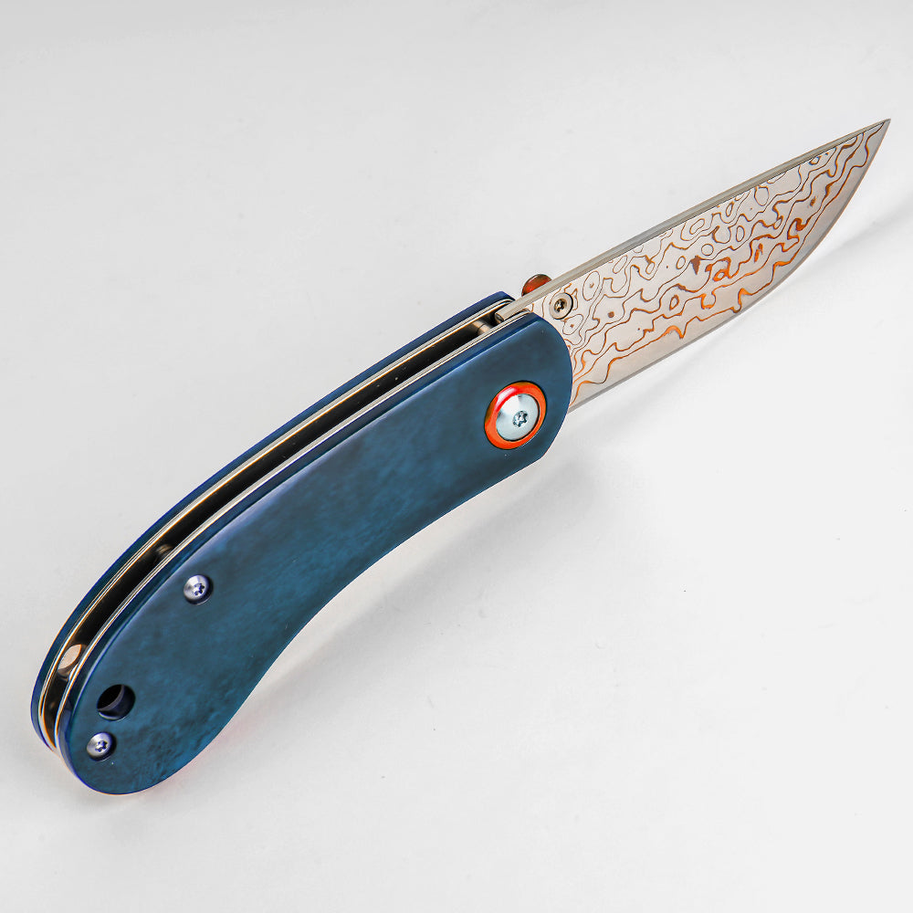 SHINK NDM-BLUE-HT Brass Damascus Steel Folding Pocket Knife | Copper Damascus Blade, Deep Blue Dyed Ox Bone Handle